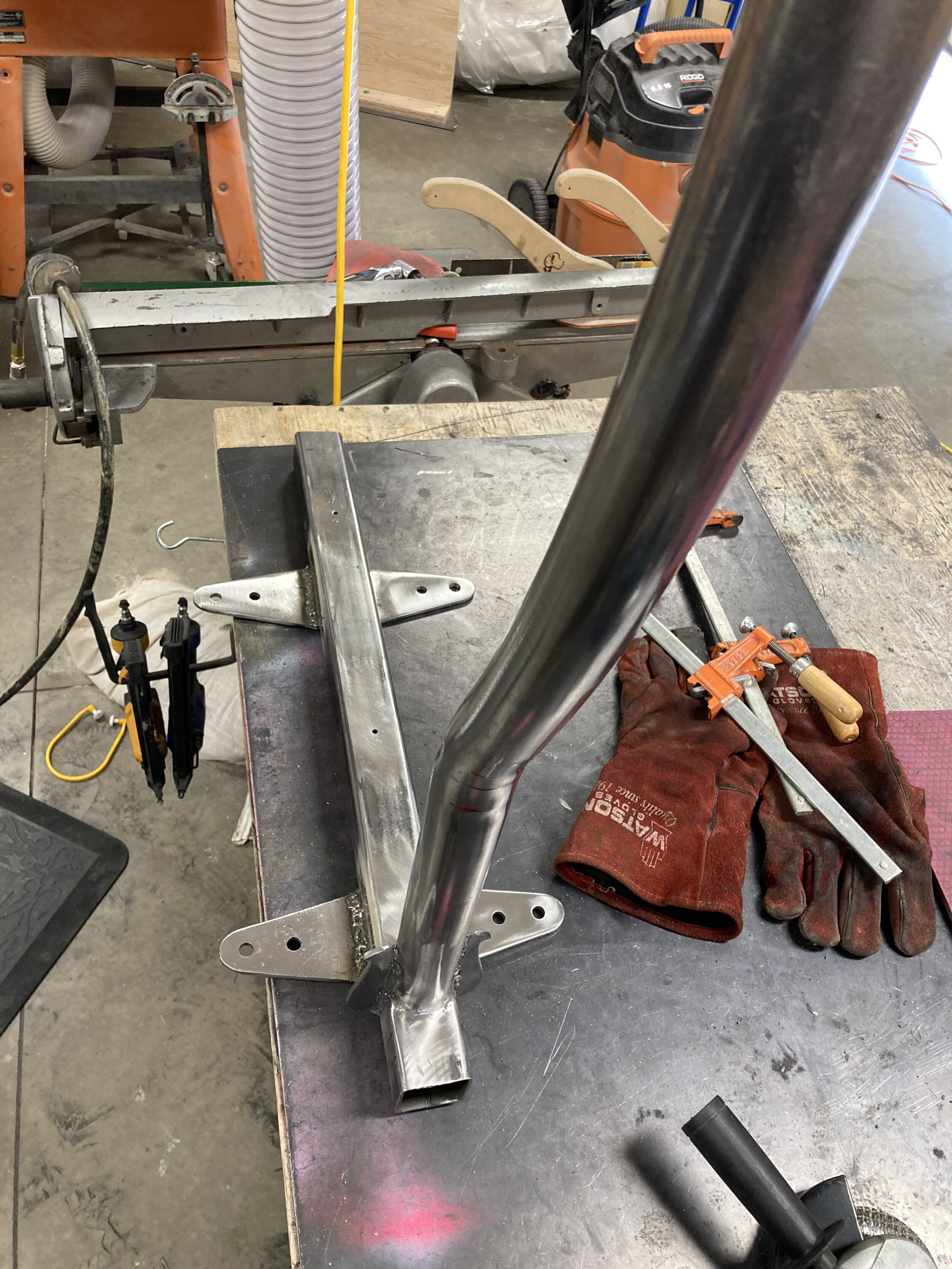 Fabricating the cantilever arm and supports: This arm was actually bolted from the back in addition to being welded with decorative lateral support gussets added.