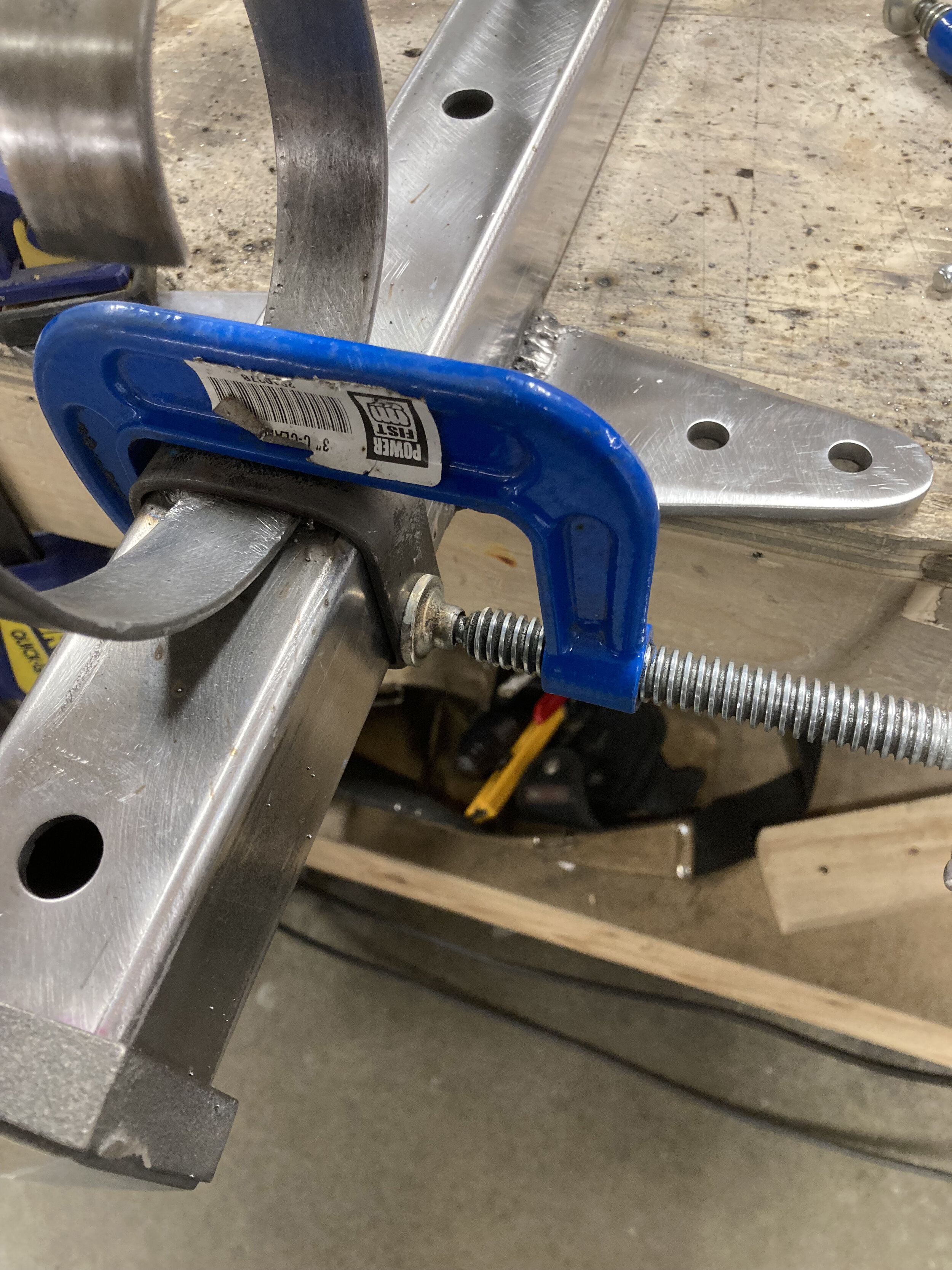 The decorative connective structure was not only welded and riveted to the post, but also strapped for maximum strength.