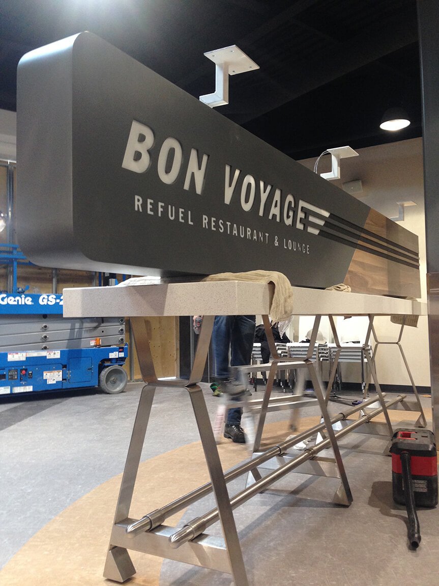 The finished sign arrives onsite and is ready to be lifted.