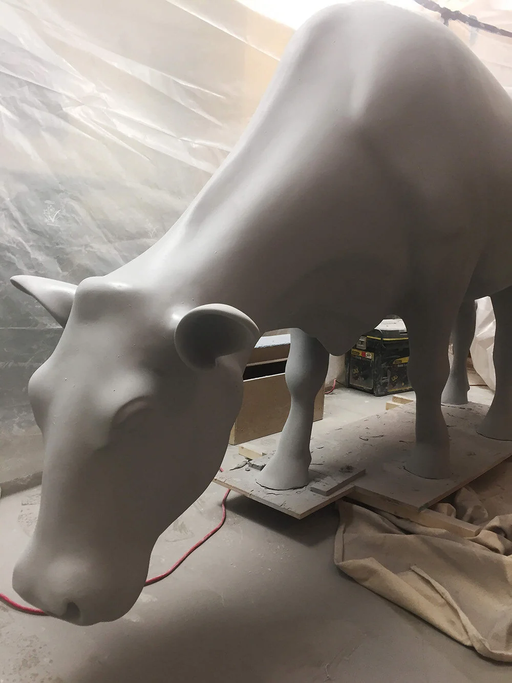 The process of priming involves multiple coats of automotive primer: each progression is sanded with a finer grit than the last - then two coats of paint to finish her off.